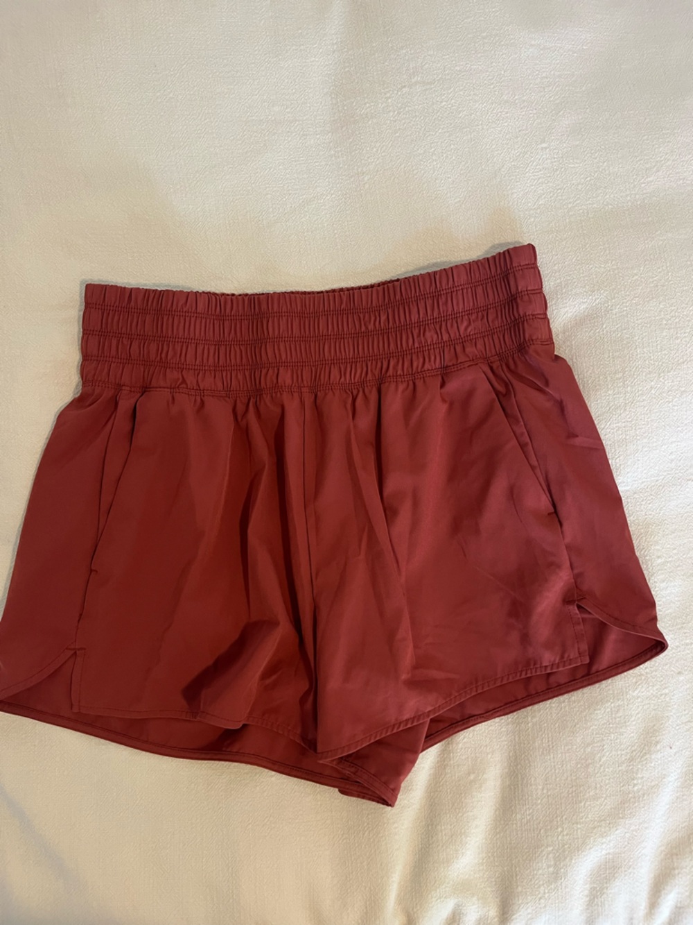 Old Navy Smocked-Waist Athletic Shorts in Rust Red